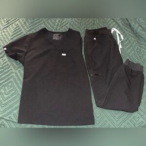 FIGS scrubs. Top XL bottom L